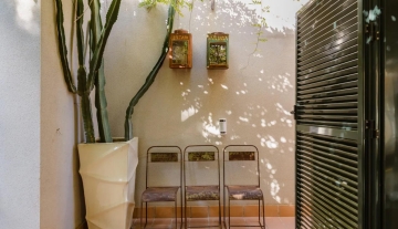 Resa Estates Ibiza te koop for sale townhouse cala tarida side garden.jpeg